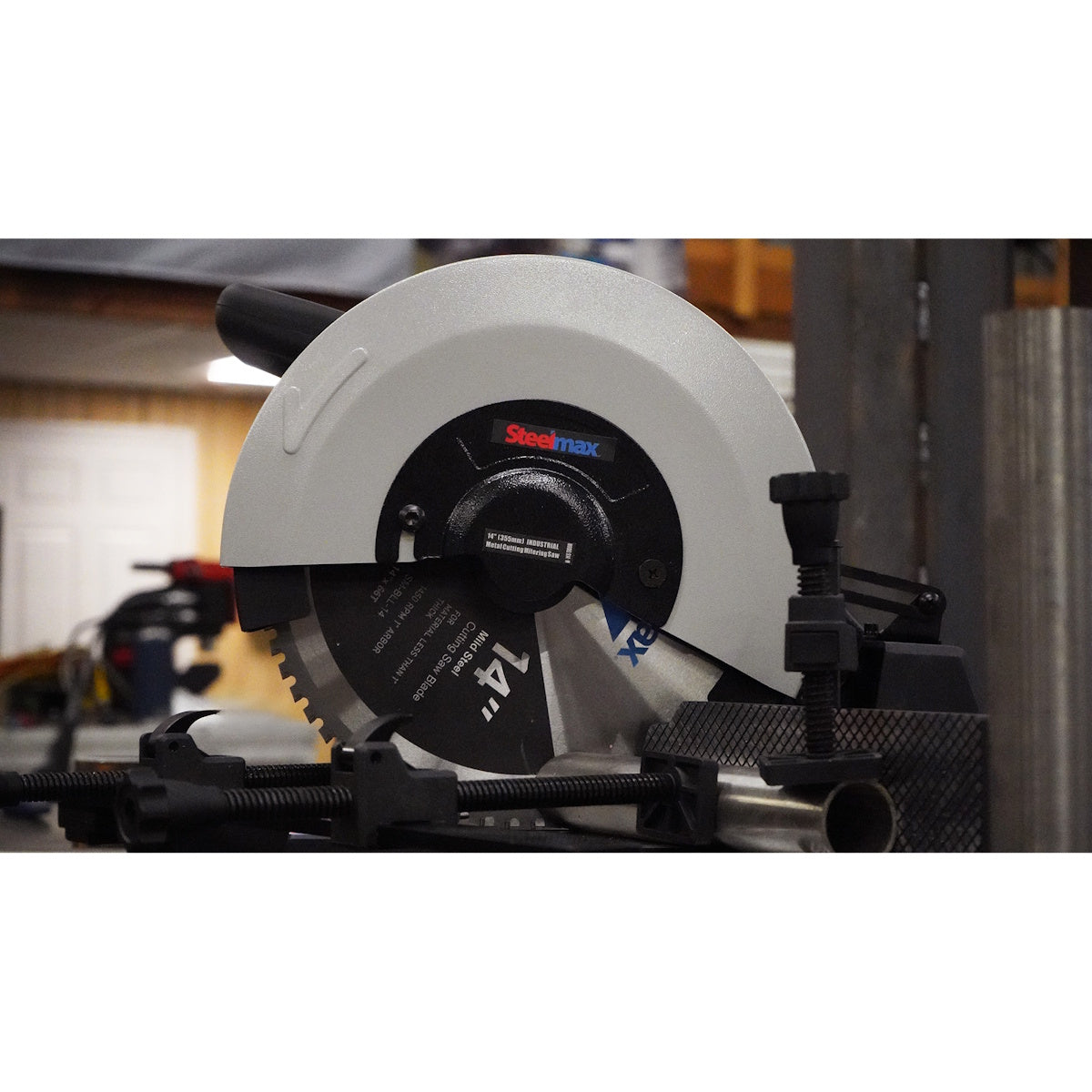 Steelmax 120V 14″ Metal Cutting Miter Saw SM-S-14-M in workshop, featured for precision cutting tasks.