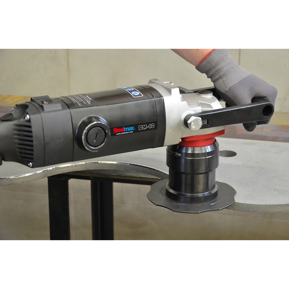 Steelmax 120V BM18 Portable Beveling Machine SM-BM18 used by gloved hands for precise metal edge preparation.