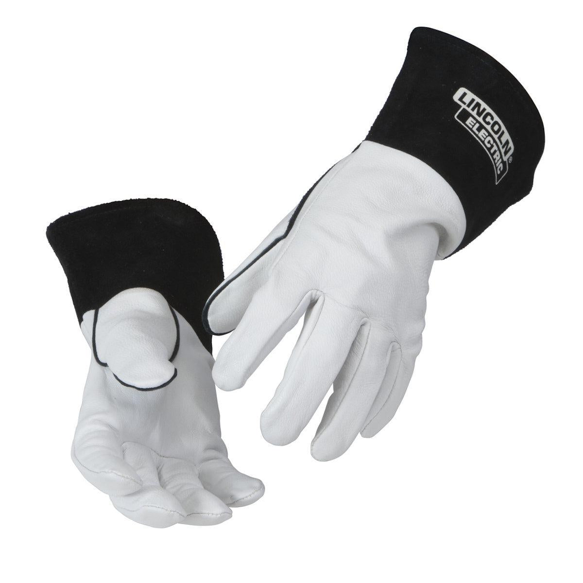 A pair of Lincoln Leather TIG Welding Gloves (K2981), white and black goat skin leather gloves with branded cuffs, shown as if worn, offer excellent heat protection for TIG welding.